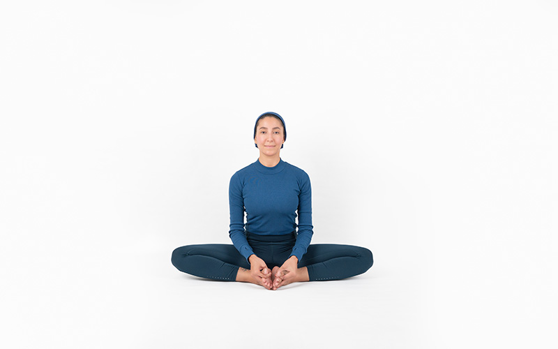 ۶. حرکت پروانه (Baddha Konasana)